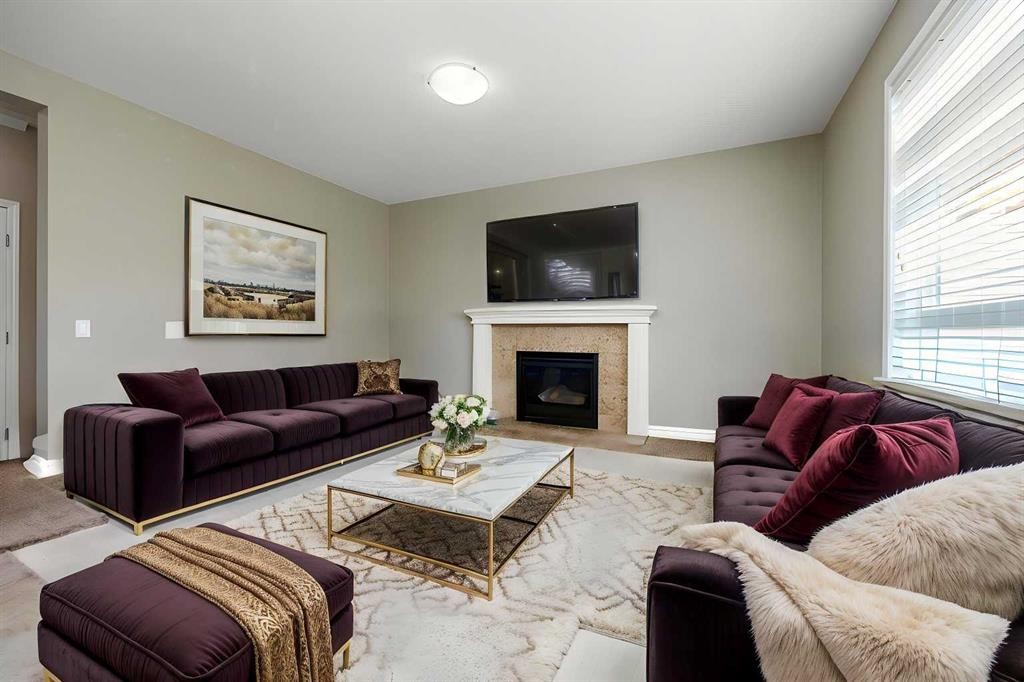 462 Williamstown Green Nw, Airdrie, AB - Indoor Photo Showing Living Room With Fireplace