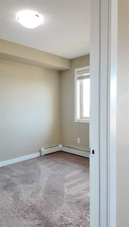 420-7110 80 Avenue Ne, Calgary, AB - Indoor Photo Showing Other Room