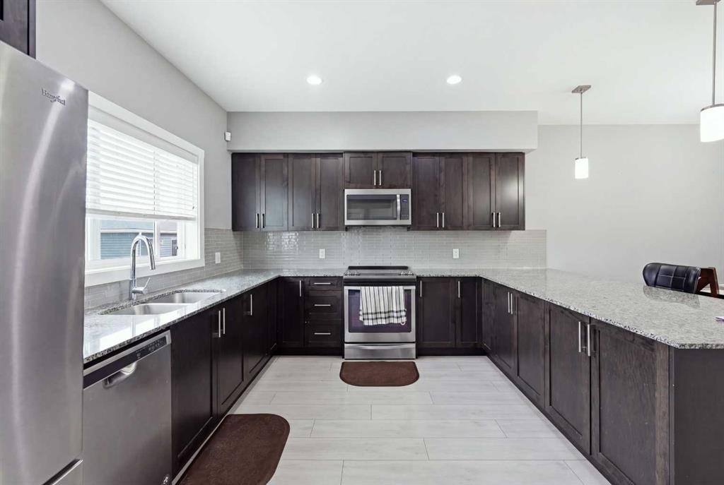 1636 Cornerstone Boulevard Ne, Calgary, AB - Indoor Photo Showing Kitchen With Double Sink With Upgraded Kitchen