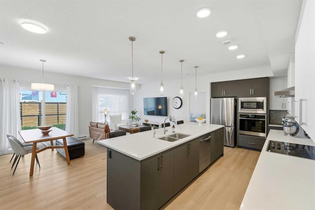 3108-20295 Seton Way Se, Calgary, AB - Indoor Photo Showing Kitchen With Stainless Steel Kitchen With Double Sink With Upgraded Kitchen