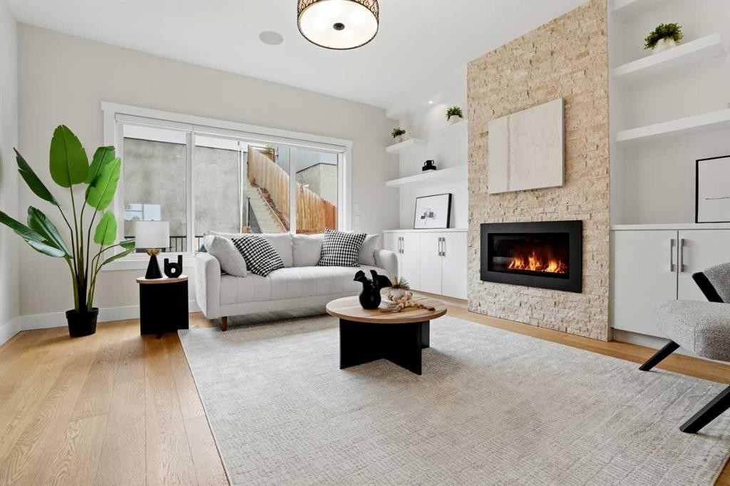 3817 Centre A Street Ne, Calgary, AB - Indoor Photo Showing Living Room With Fireplace