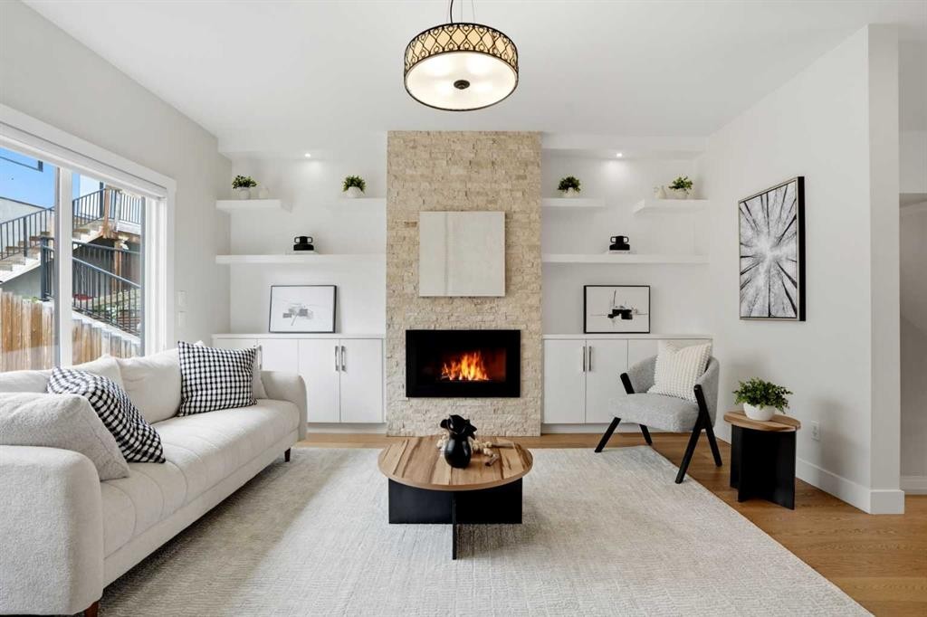 3817 Centre A Street Ne, Calgary, AB - Indoor Photo Showing Living Room With Fireplace