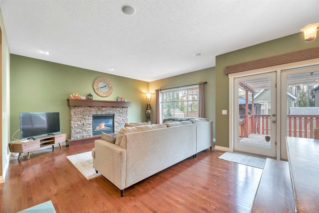 331 Mahogany Court Se, Calgary, AB - Indoor Photo Showing Living Room With Fireplace