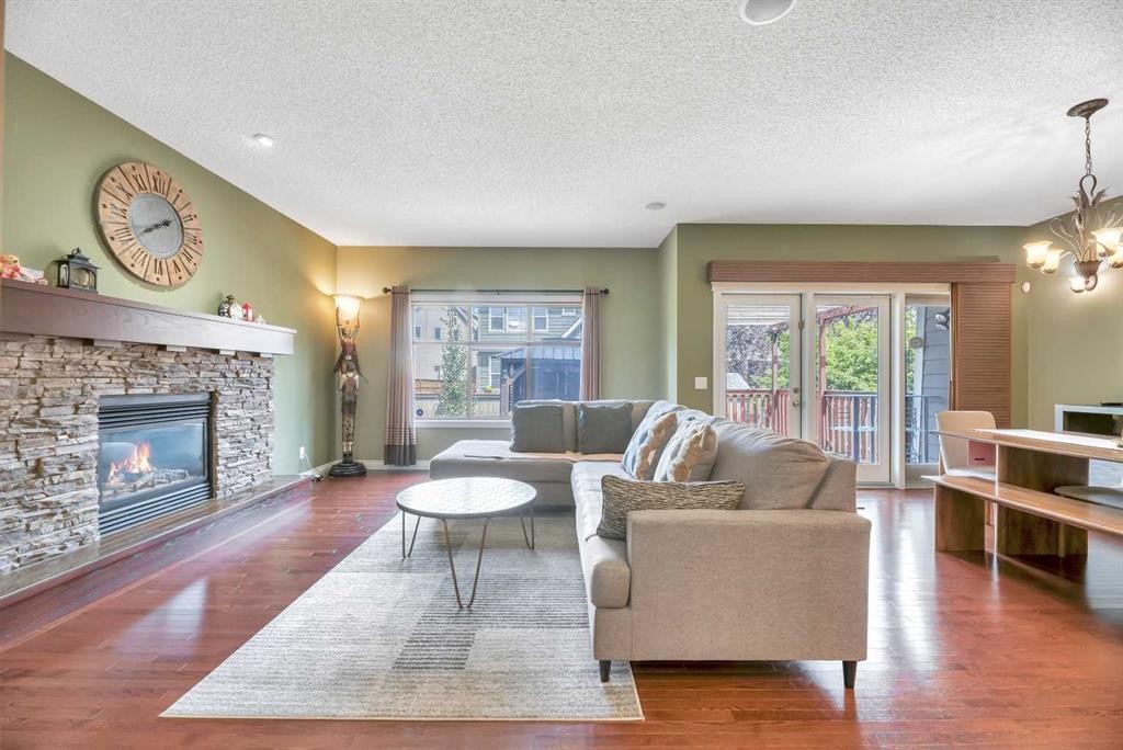 331 Mahogany Court Se, Calgary, AB - Indoor Photo Showing Living Room With Fireplace