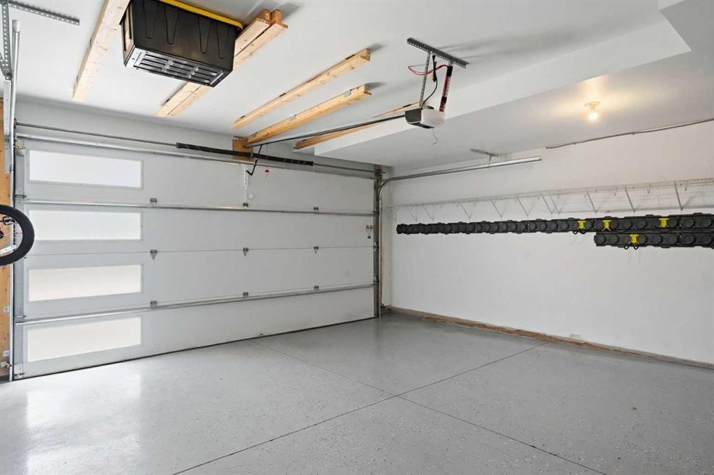 108 Na'A Heights Sw, Calgary, AB - Indoor Photo Showing Garage