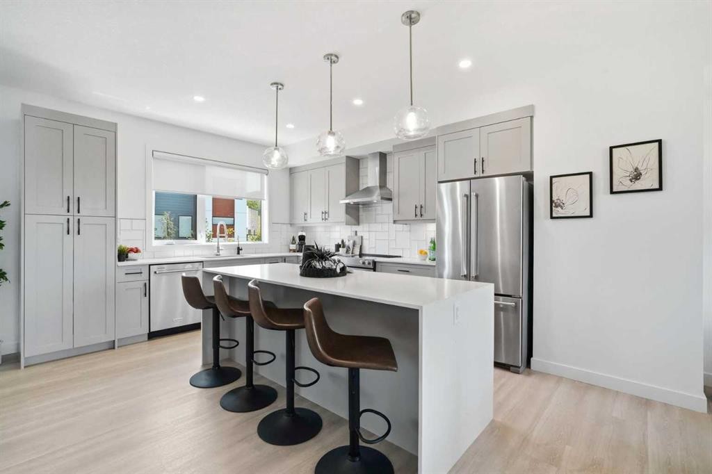 108 Na'A Heights Sw, Calgary, AB - Indoor Photo Showing Kitchen With Stainless Steel Kitchen With Upgraded Kitchen