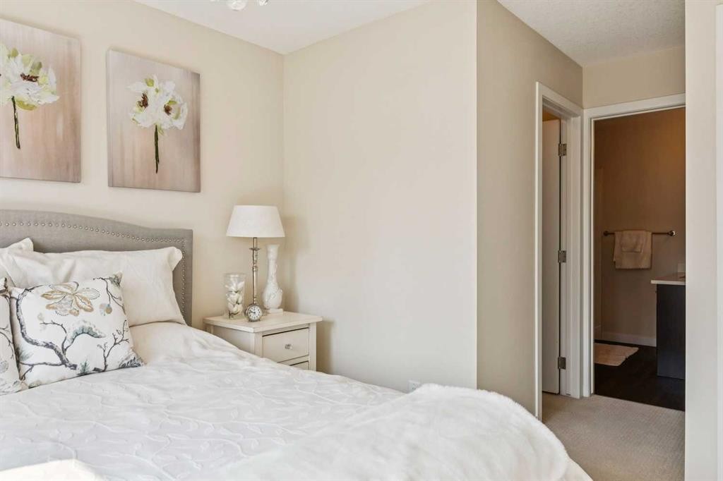 16 Westpark Common Sw, Calgary, AB - Indoor Photo Showing Bedroom