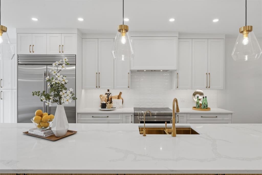 12 Prominence Point Sw, Calgary, AB - Indoor Photo Showing Kitchen With Upgraded Kitchen