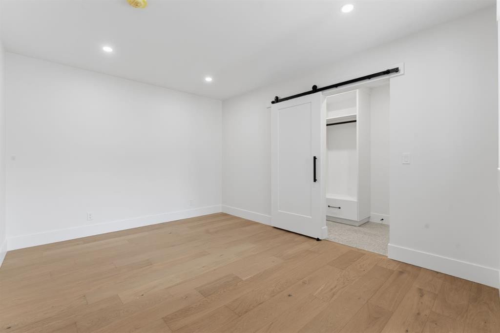 12 Prominence Point Sw, Calgary, AB - Indoor Photo Showing Other Room