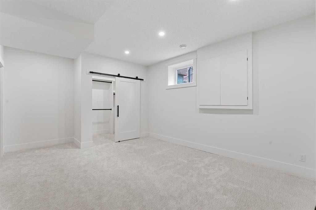 12 Prominence Point Sw, Calgary, AB - Indoor Photo Showing Other Room