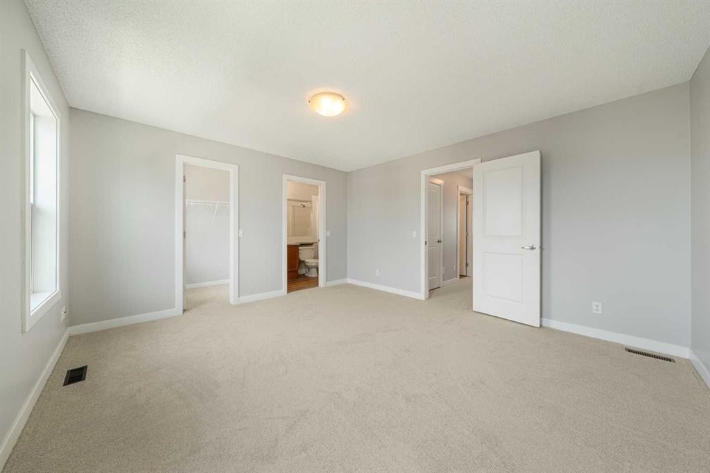 183 Silverado Way Sw, Calgary, AB - Indoor Photo Showing Other Room