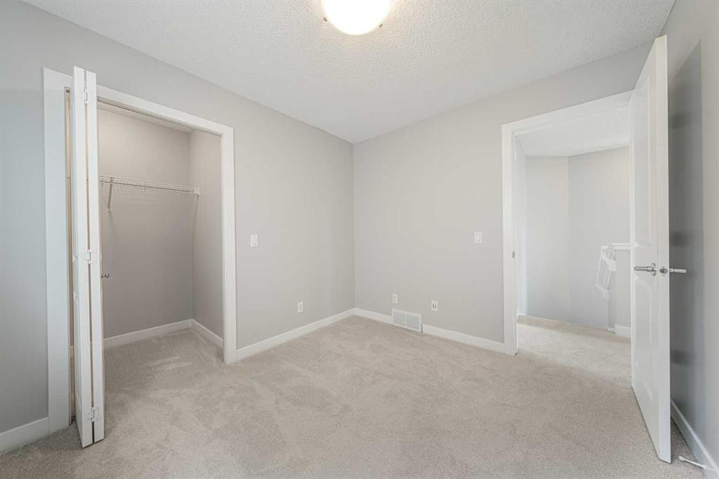 183 Silverado Way Sw, Calgary, AB - Indoor Photo Showing Other Room