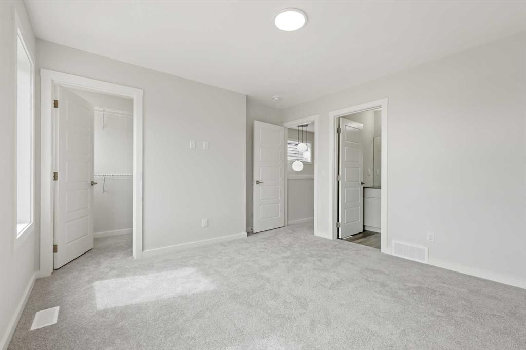 36 Heartwood Lane Se, Calgary, AB - Indoor Photo Showing Other Room