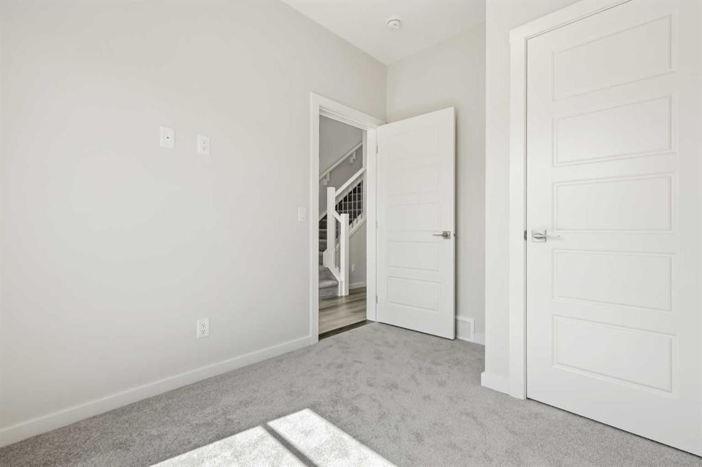 36 Heartwood Lane Se, Calgary, AB - Indoor Photo Showing Other Room