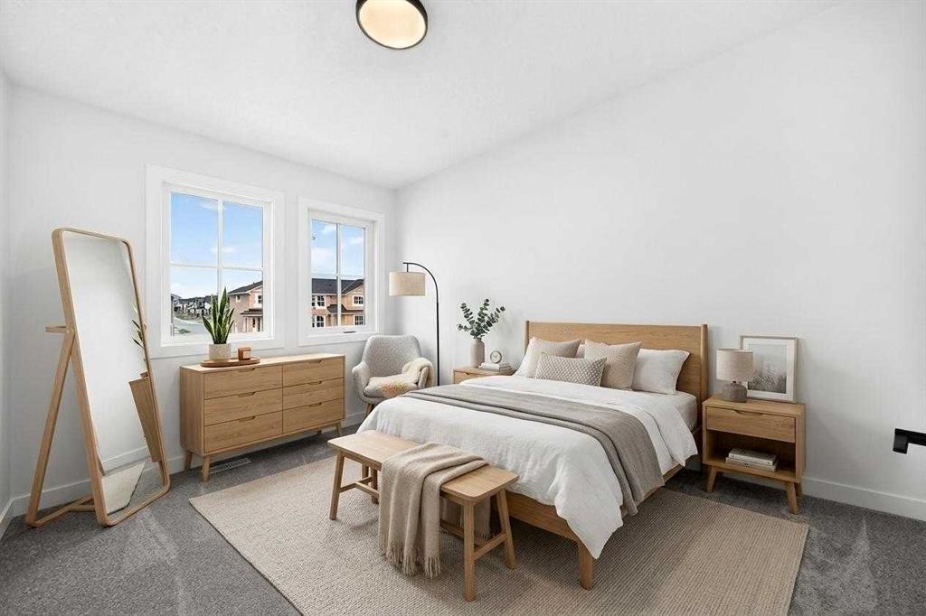 182 Lanark Gate Se, Airdrie, AB - Indoor Photo Showing Bedroom