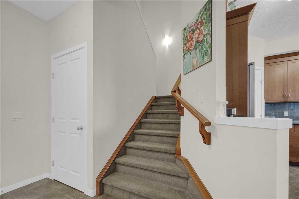 226 Sunset Point, Cochrane, AB - Indoor Photo Showing Other Room
