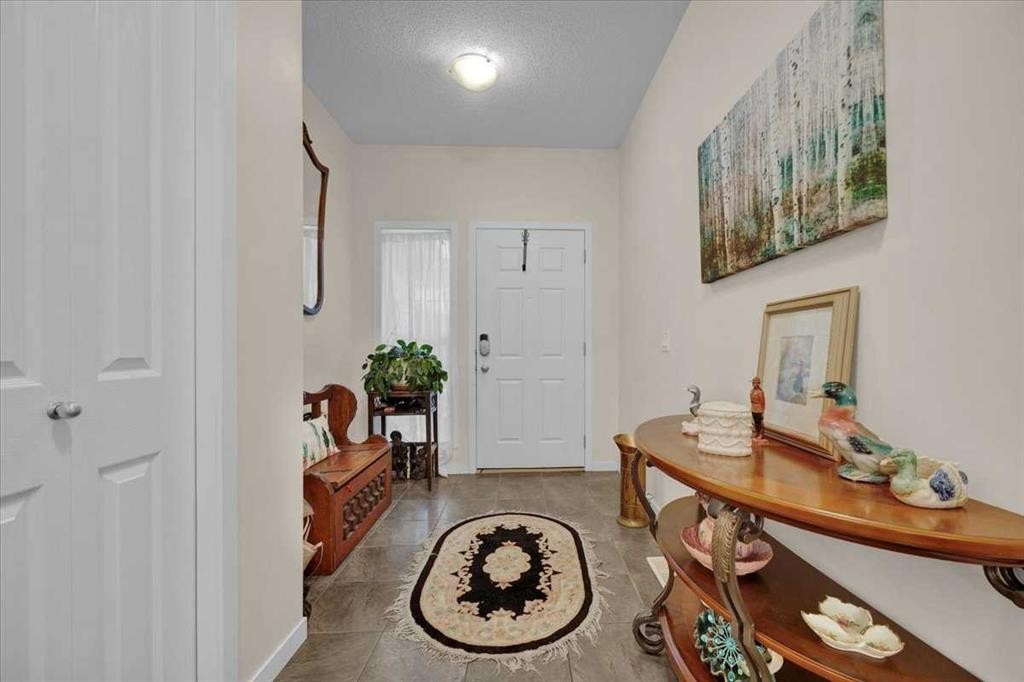 226 Sunset Point, Cochrane, AB - Indoor Photo Showing Other Room