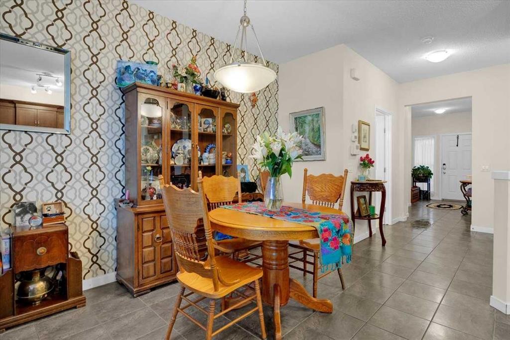 226 Sunset Point, Cochrane, AB - Indoor Photo Showing Other Room