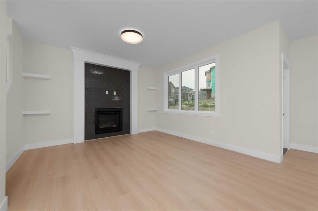 500 Rivercrest View, Cochrane, AB - Indoor With Fireplace