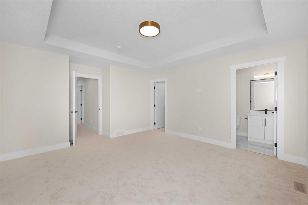 500 Rivercrest View, Cochrane, AB - Indoor Photo Showing Other Room
