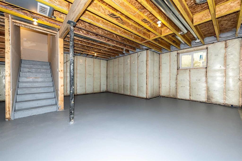 500 Rivercrest View, Cochrane, AB - Indoor Photo Showing Basement