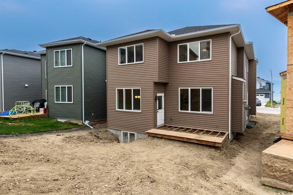 500 Rivercrest View, Cochrane, AB - Outdoor With Exterior