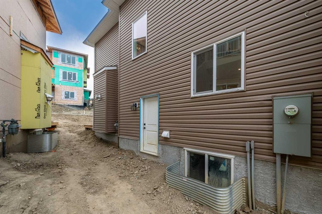 500 Rivercrest View, Cochrane, AB - Outdoor With Exterior