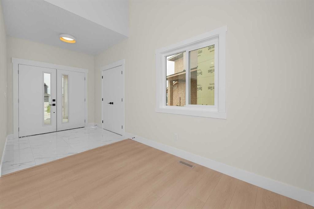 500 Rivercrest View, Cochrane, AB - Indoor Photo Showing Other Room
