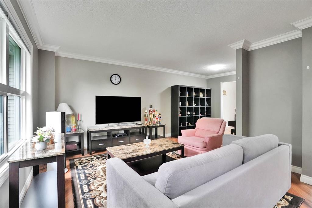 199 Cedarwood Lane Sw, Calgary, AB - Indoor Photo Showing Living Room