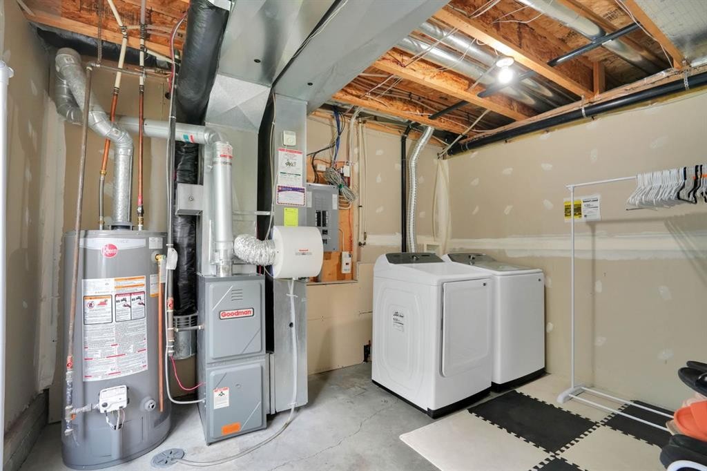 199 Cedarwood Lane Sw, Calgary, AB - Indoor Photo Showing Laundry Room