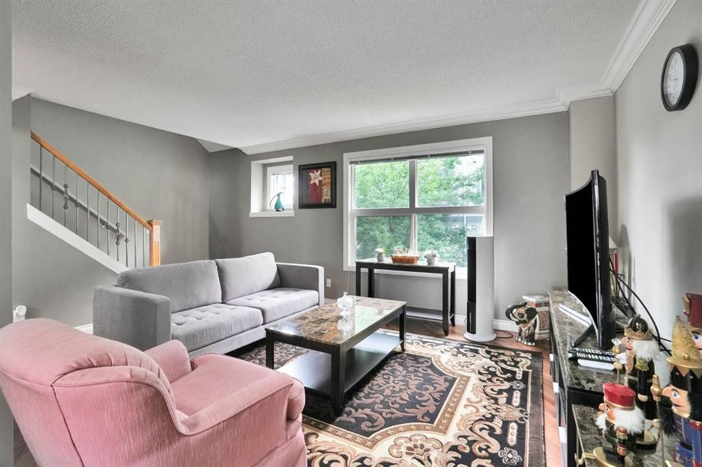 199 Cedarwood Lane Sw, Calgary, AB - Indoor Photo Showing Living Room