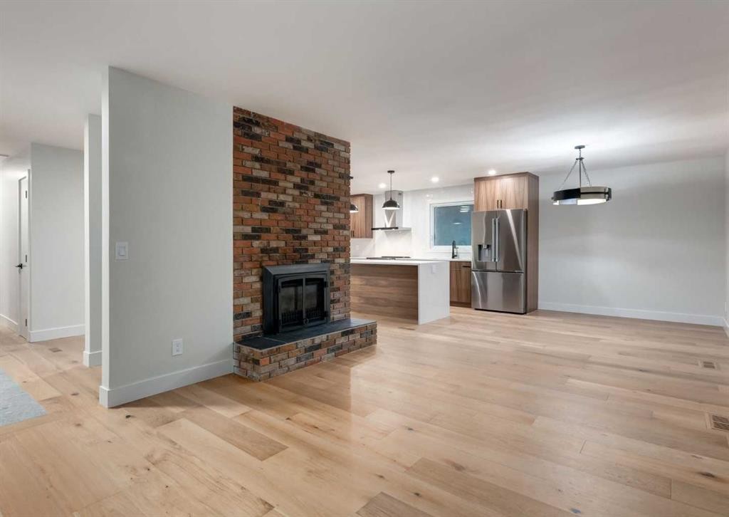 6460 Silver Ridge Way Nw, Calgary, AB - Indoor Photo Showing Living Room With Fireplace