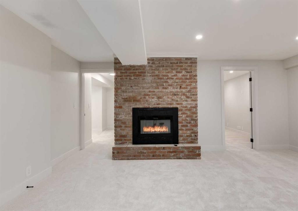 6460 Silver Ridge Way Nw, Calgary, AB - Indoor Photo Showing Living Room With Fireplace