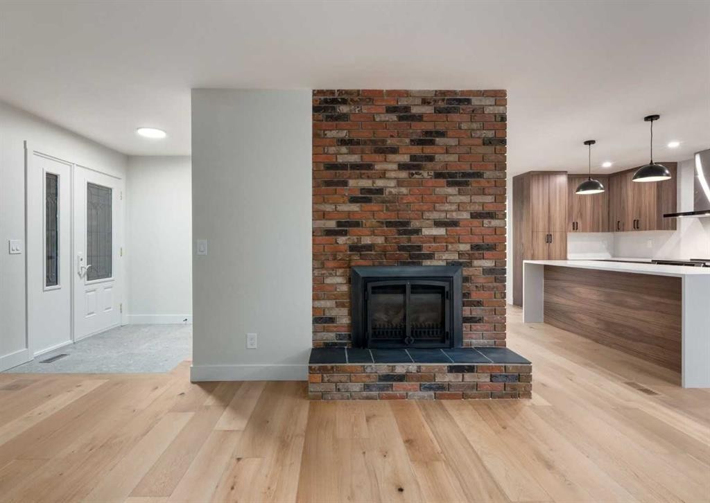 6460 Silver Ridge Way Nw, Calgary, AB - Indoor Photo Showing Living Room With Fireplace