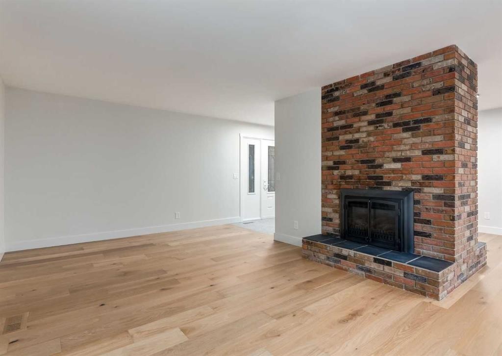 6460 Silver Ridge Way Nw, Calgary, AB - Indoor Photo Showing Living Room With Fireplace