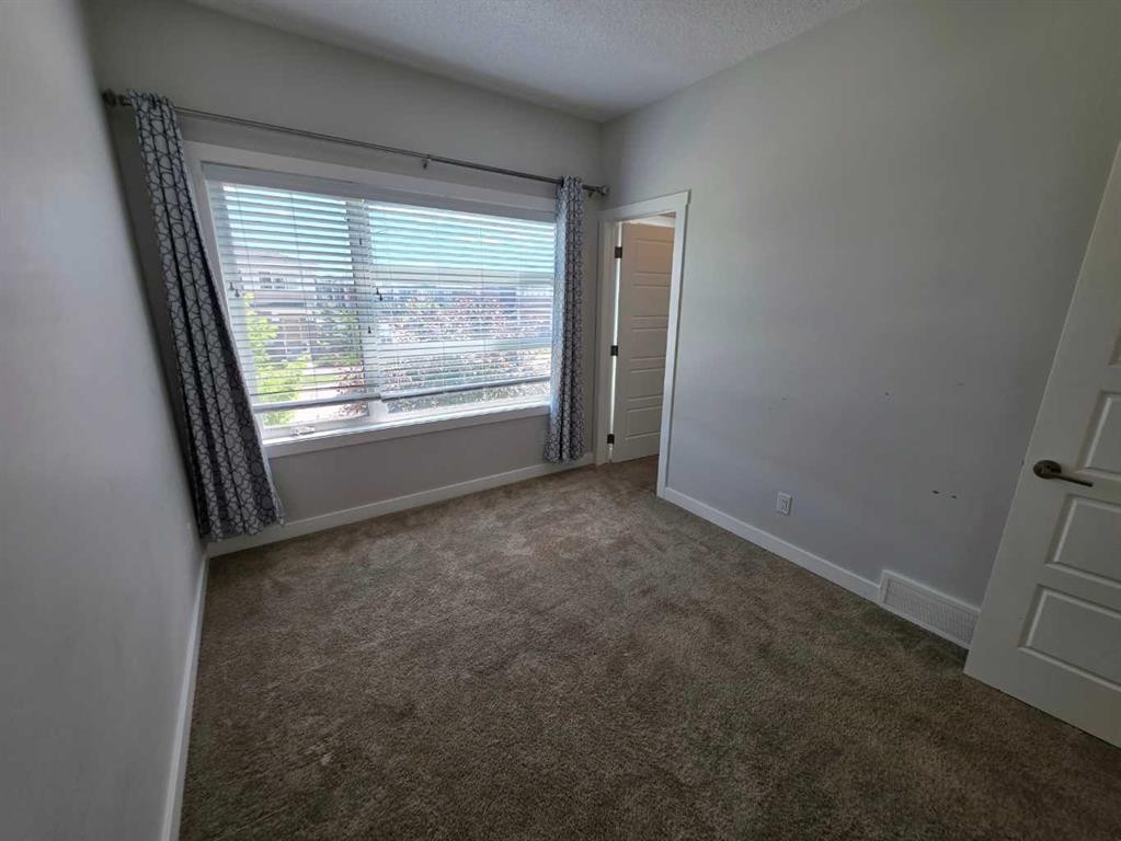 107 Lucas Boulevard Nw, Calgary, AB - Indoor Photo Showing Other Room