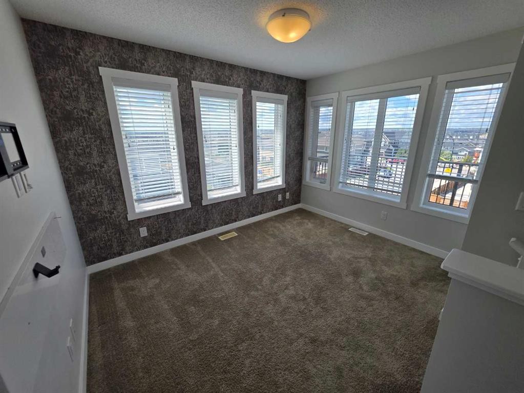 107 Lucas Boulevard Nw, Calgary, AB - Indoor Photo Showing Other Room