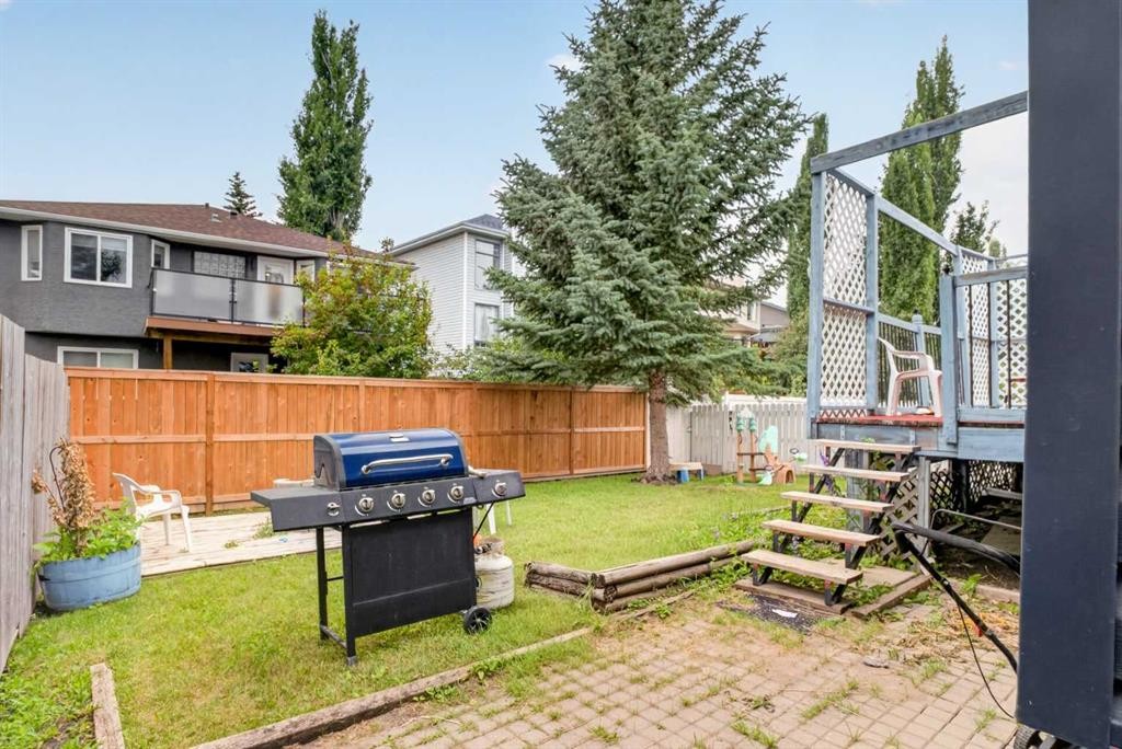 403 Shawinigan Drive Sw, Calgary, AB - Outdoor With Deck Patio Veranda
