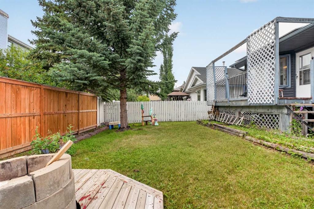 403 Shawinigan Drive Sw, Calgary, AB - Outdoor With Deck Patio Veranda