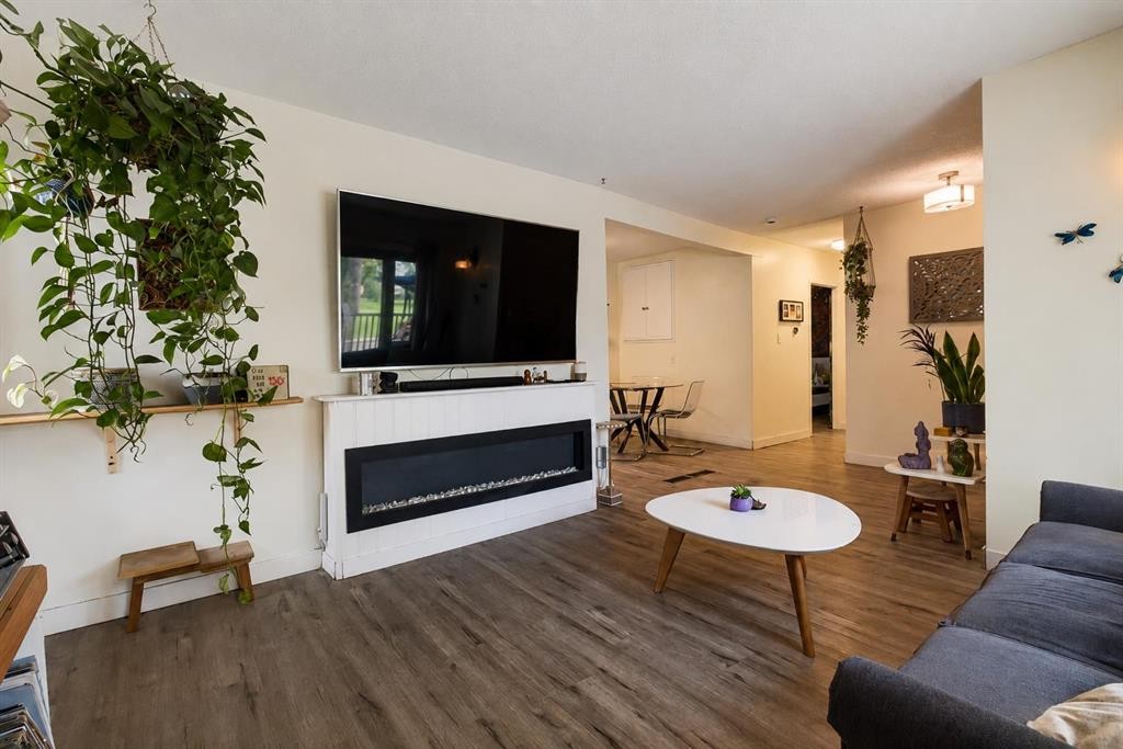 6420 18 Street Se, Calgary, AB - Indoor Photo Showing Living Room With Fireplace