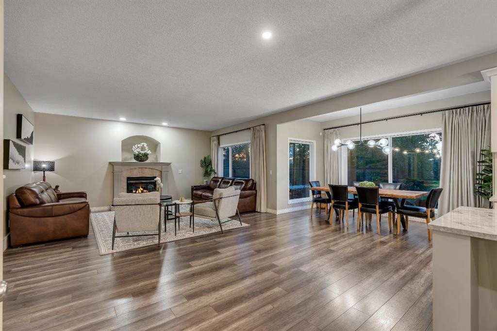 112 Pinto Lane Se, Airdrie, AB - Indoor Photo Showing Living Room With Fireplace