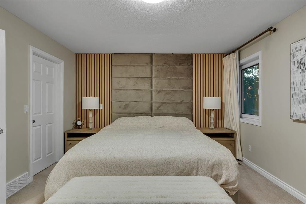 112 Pinto Lane Se, Airdrie, AB - Indoor Photo Showing Bedroom
