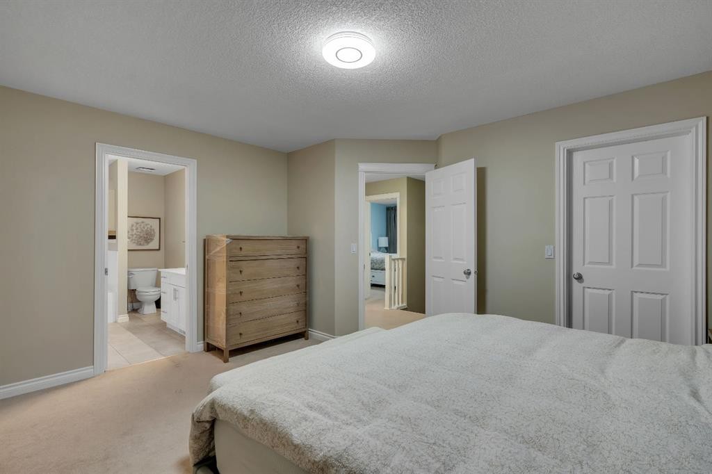 112 Pinto Lane Se, Airdrie, AB - Indoor Photo Showing Bedroom
