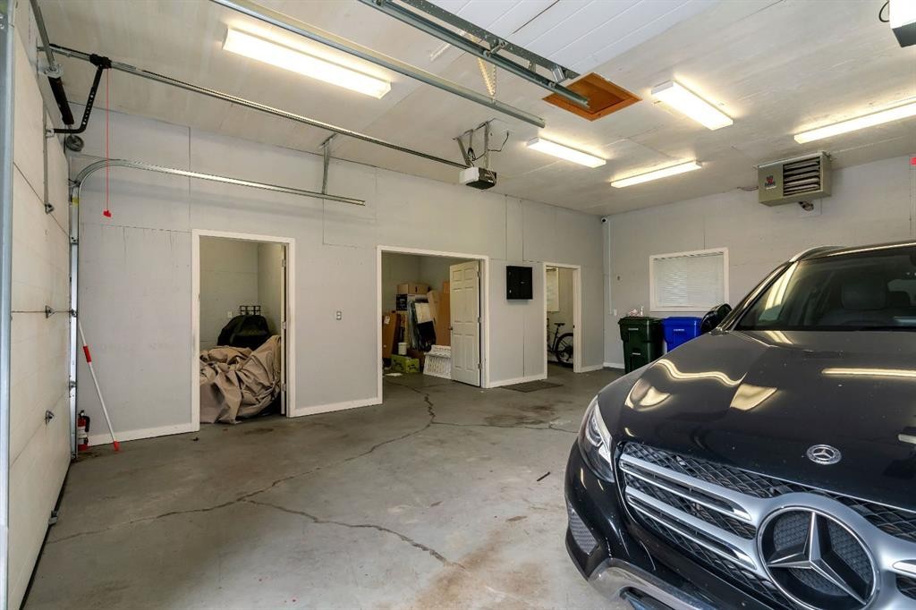 112 Pinto Lane Se, Airdrie, AB - Indoor Photo Showing Garage
