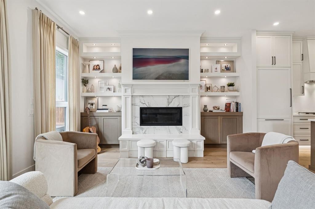 4407 17 Street Sw, Calgary, AB - Indoor Photo Showing Living Room With Fireplace