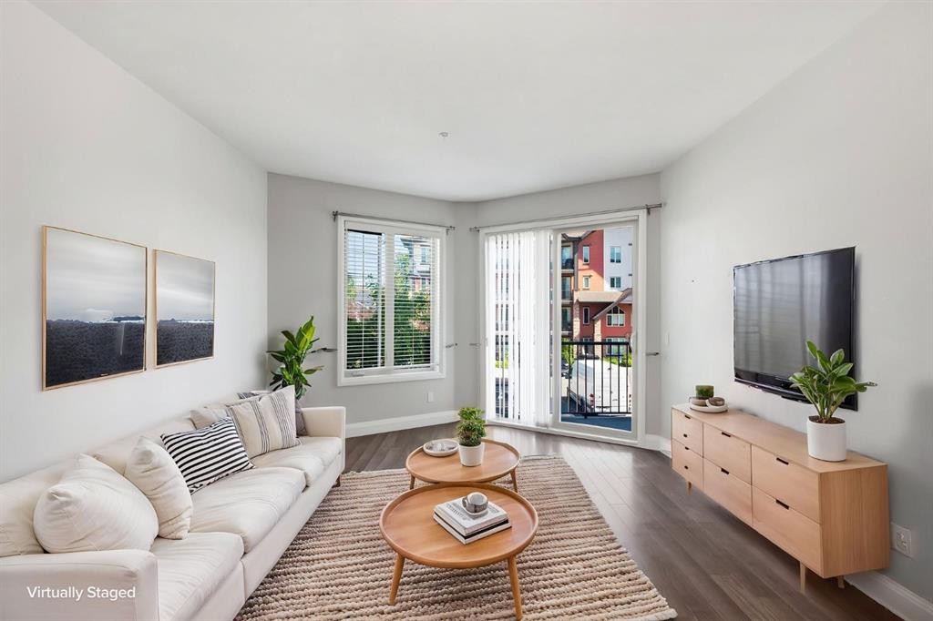 2208-15 Sunset Square, Cochrane, AB - Indoor Photo Showing Living Room