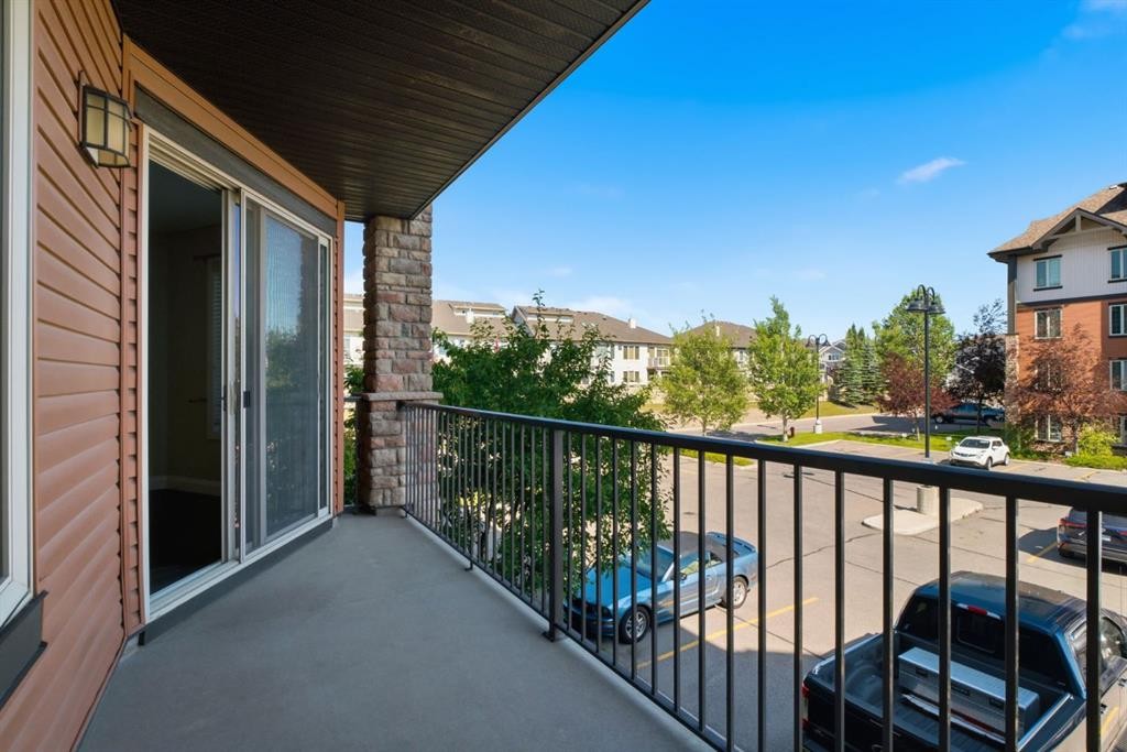 2208-15 Sunset Square, Cochrane, AB - Outdoor With Balcony With Exterior