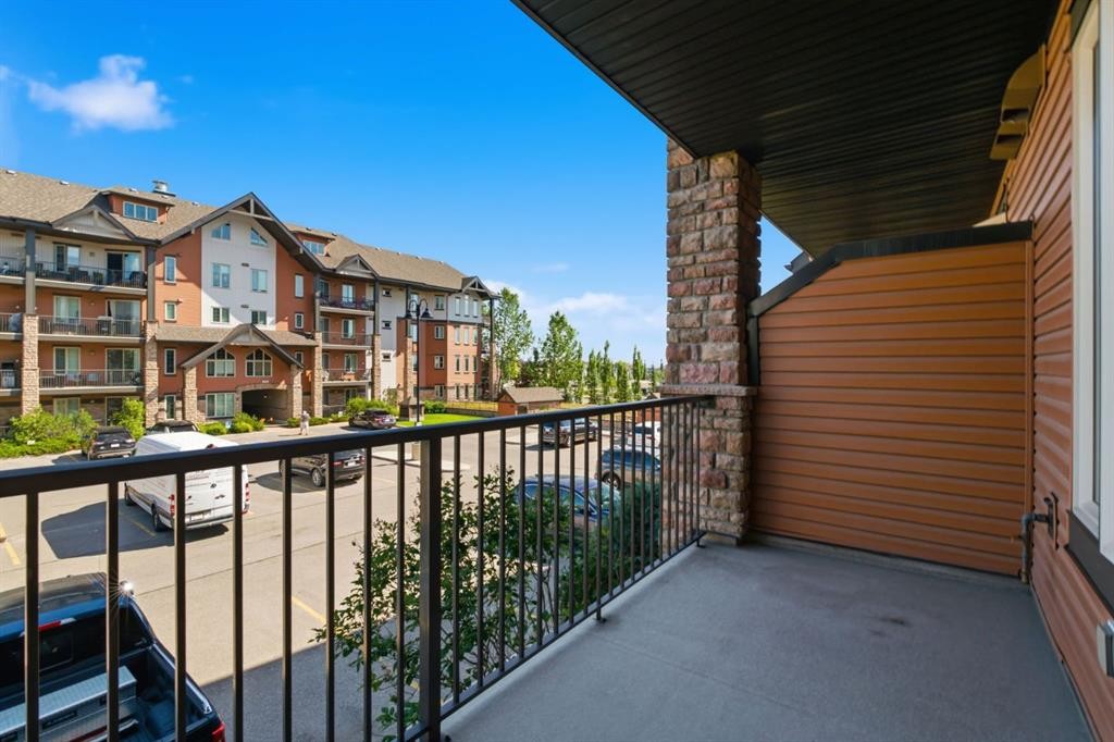 2208-15 Sunset Square, Cochrane, AB - Outdoor With Balcony With Exterior