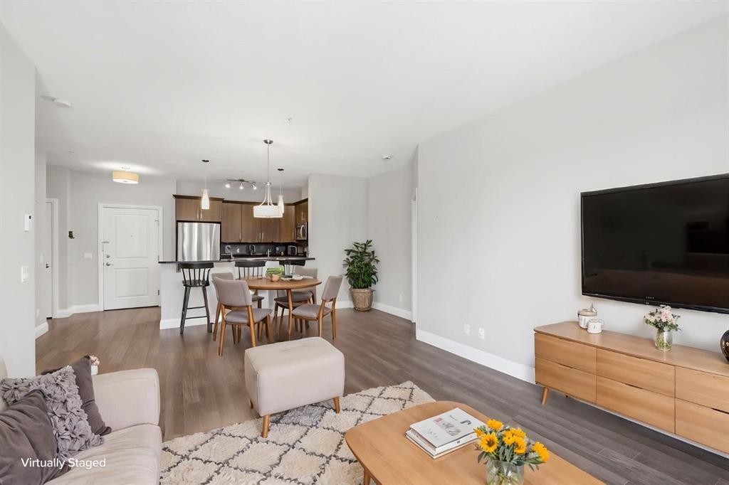 2208-15 Sunset Square, Cochrane, AB - Indoor Photo Showing Living Room