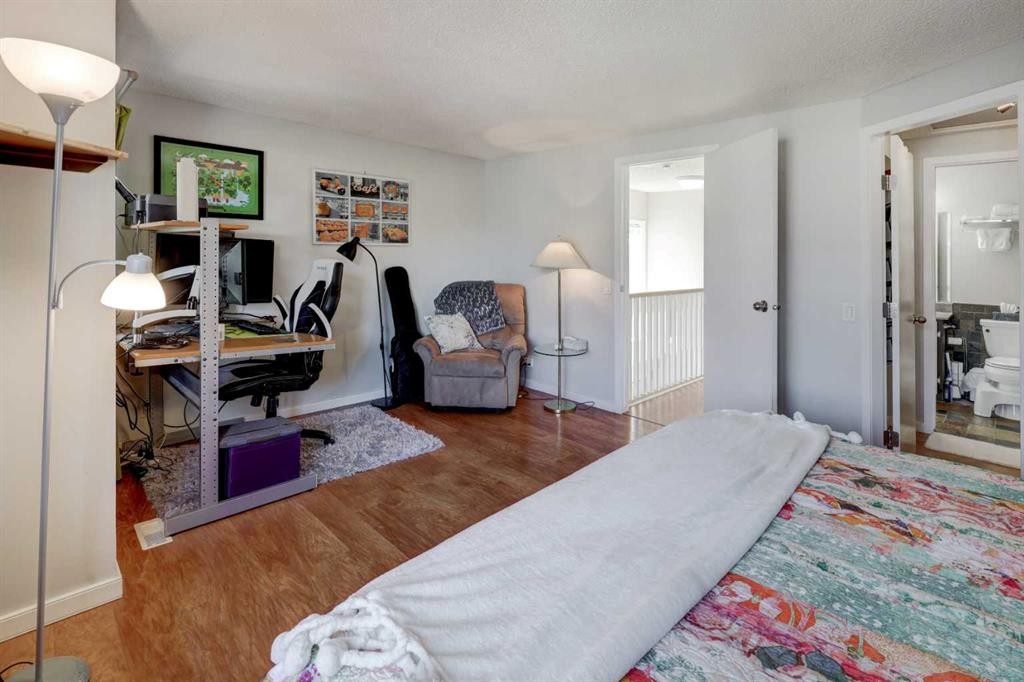 738 Queenston Terrace Se, Calgary, AB - Indoor Photo Showing Bedroom